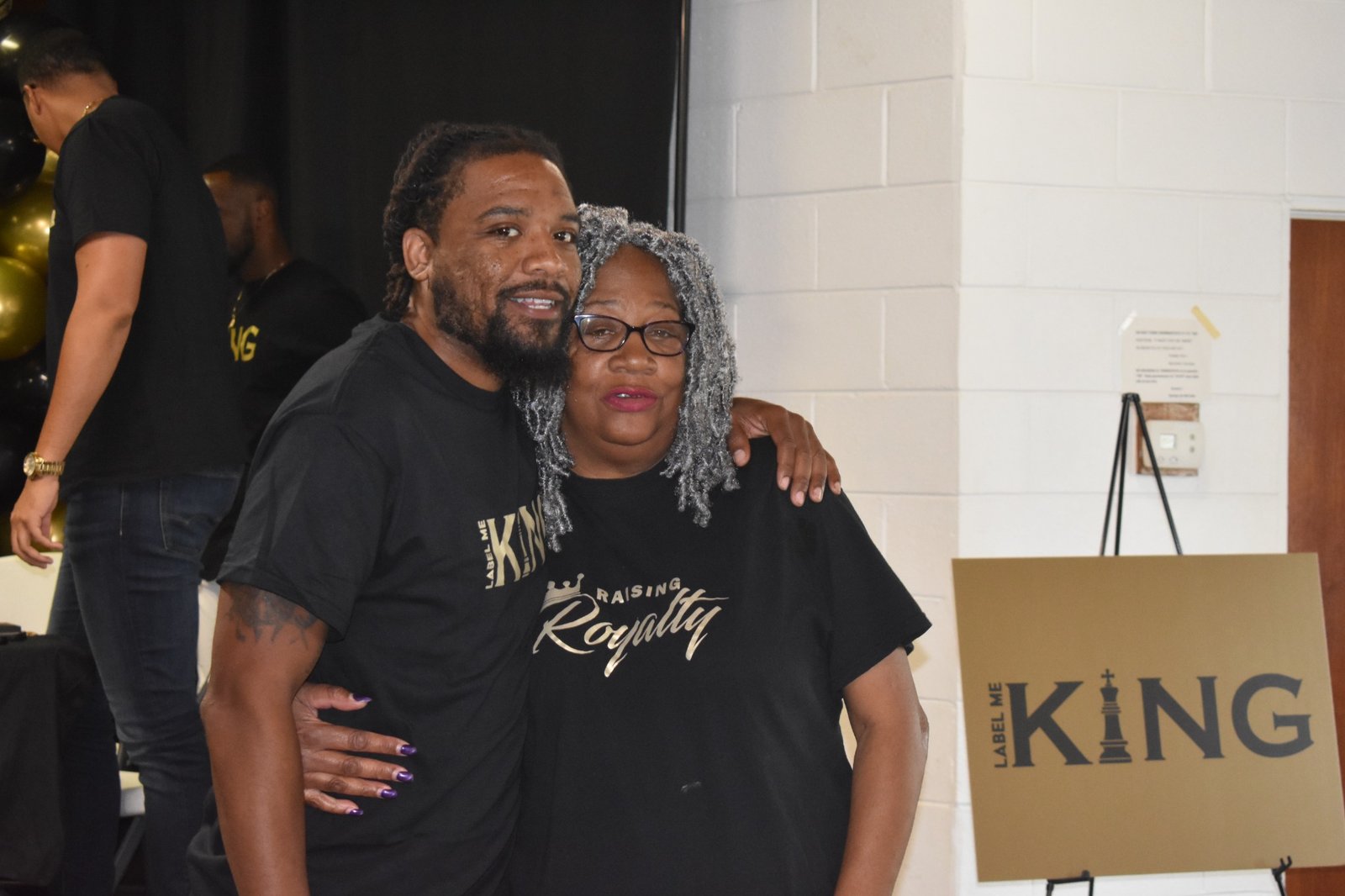 Community members sharing a moment together.